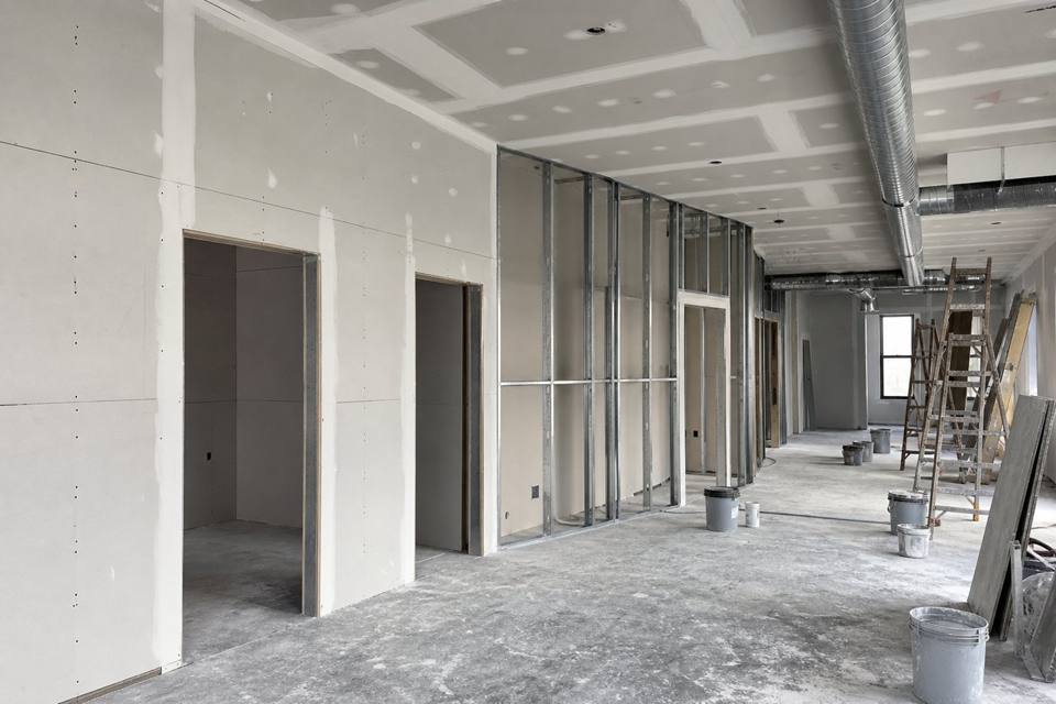 Commercial drywall buildout with metal studs and sheetrock for Vero Beach drywall projects